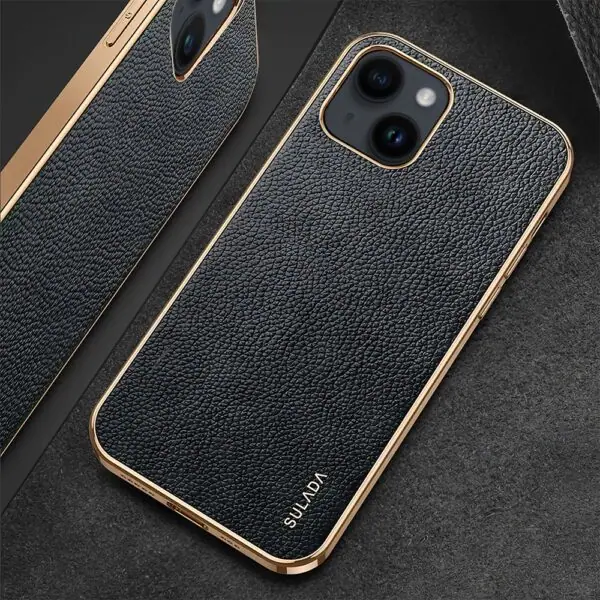 Elegancki czarny etui na smartfon z złotym akcentem.