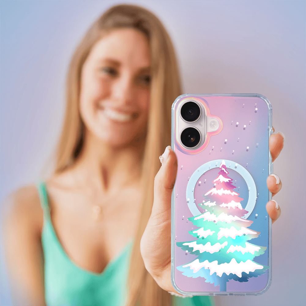 Etui do iPhone 16 MagSafe Christmas, choinkowa aurora, zmieniające kolor (2) Kobieta z etui na telefon z choinką.