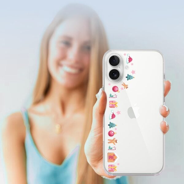 Etui do iPhone 16, świąteczne ozdoby, przeźroczyste (6) Kobieta prezentuje iPhone'a z naklejkami.
