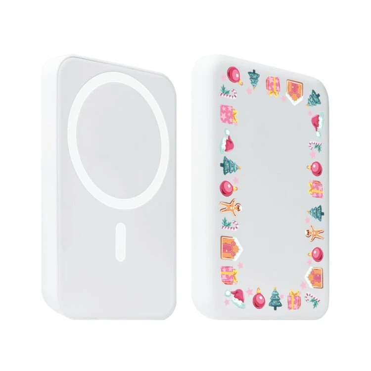Power bank 10 000 mAh do iPhone, ładowanie bezprzewodowe MagSafe, świąteczne ozdoby, biały (1) Dwa białe bezprzewodowe ładowarki, jedna z naklejkami.