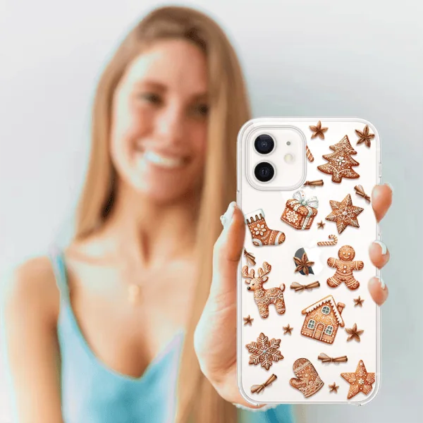 Kobieta z etui na telefon z piernikami.